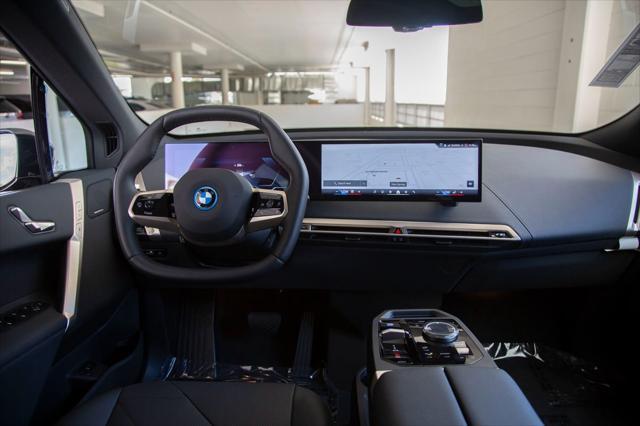 new 2025 BMW iX car, priced at $95,825