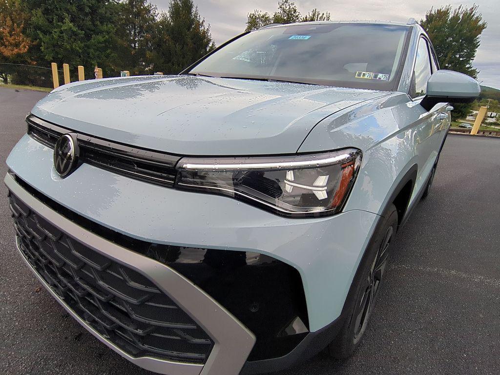 new 2025 Volkswagen Taos car, priced at $29,322