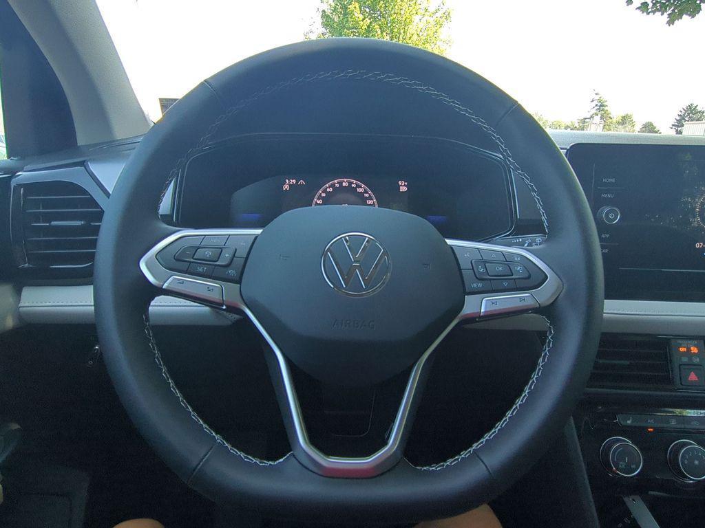 new 2025 Volkswagen Taos car, priced at $27,094