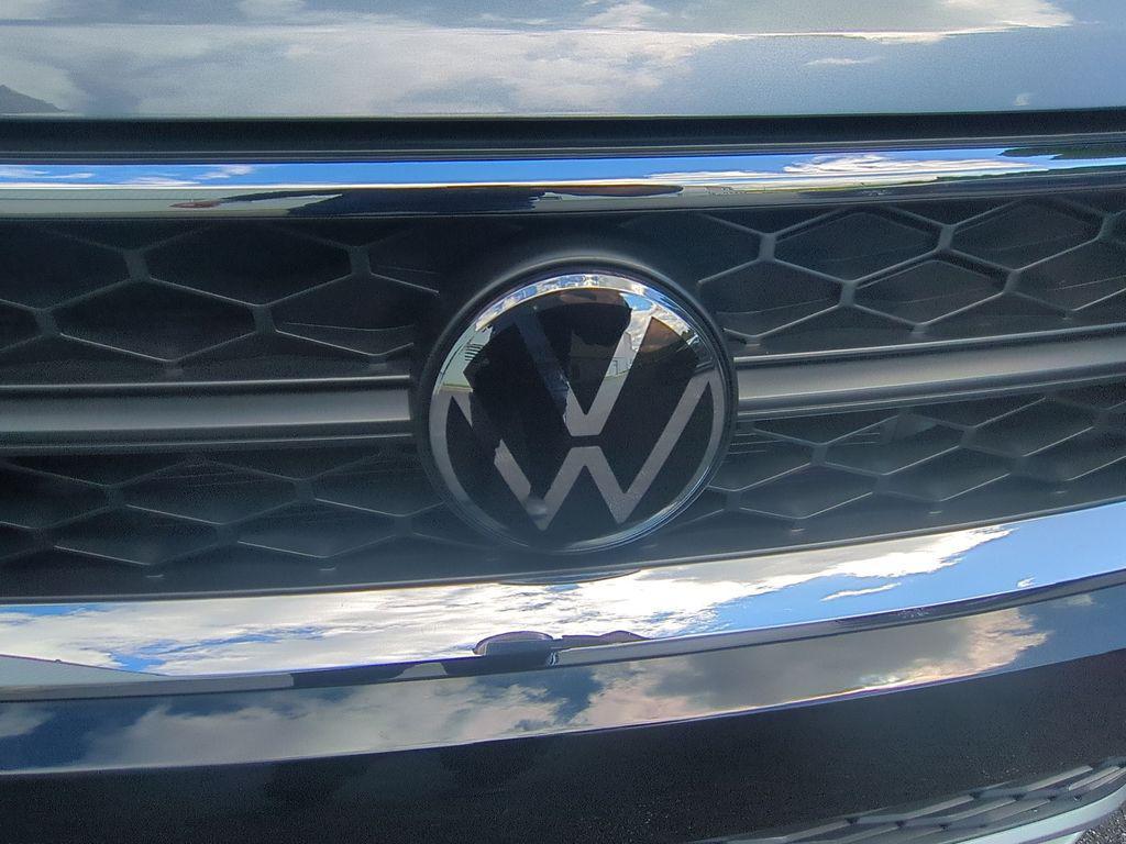 used 2023 Volkswagen Taos car, priced at $22,995
