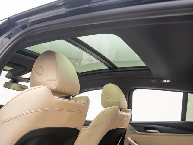 used 2023 BMW X4 car, priced at $44,750