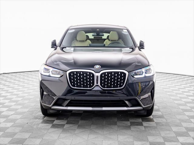 used 2023 BMW X4 car, priced at $44,750