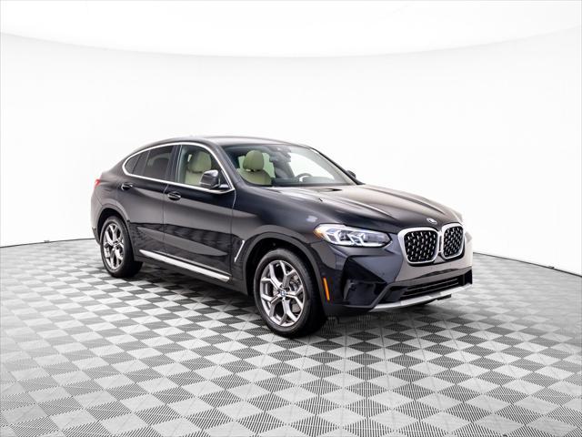 used 2023 BMW X4 car, priced at $44,750