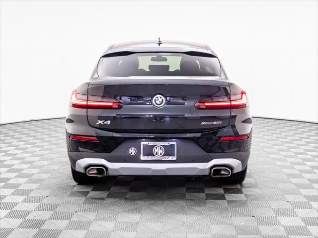used 2023 BMW X4 car, priced at $44,750