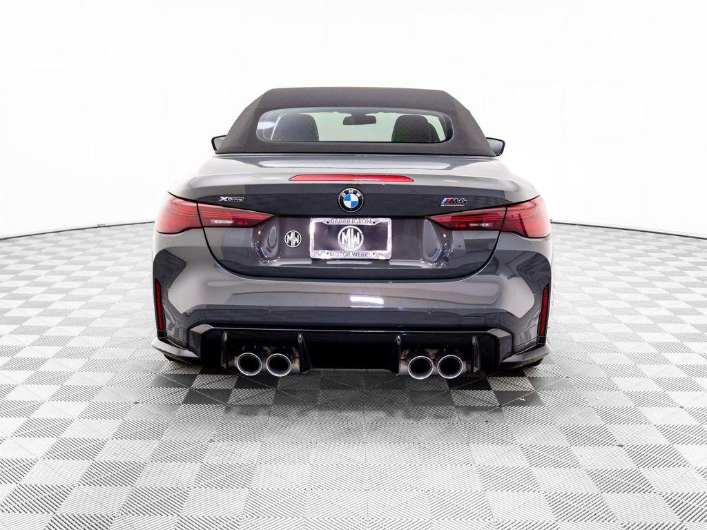 used 2025 BMW M4 car, priced at $89,078