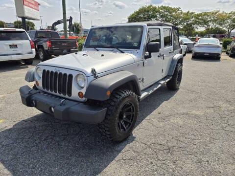 used 2012 Jeep Wrangler Unlimited car, priced at $14,995