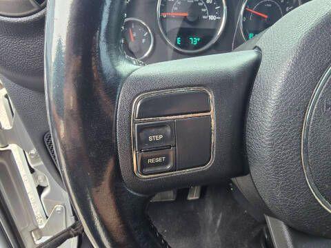 used 2012 Jeep Wrangler Unlimited car, priced at $14,995