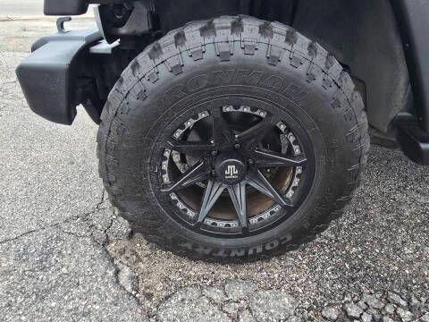 used 2012 Jeep Wrangler Unlimited car, priced at $14,995