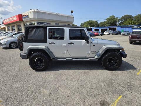 used 2012 Jeep Wrangler Unlimited car, priced at $14,995