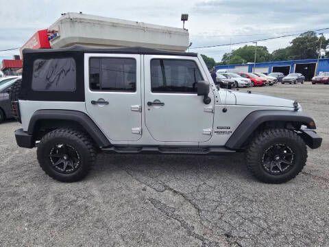 used 2012 Jeep Wrangler Unlimited car, priced at $14,995