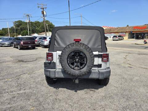 used 2012 Jeep Wrangler Unlimited car, priced at $16,500