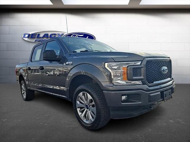 used 2018 Ford F-150 car, priced at $28,832