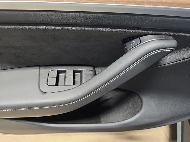 used 2024 Tesla Model Y car, priced at $34,998