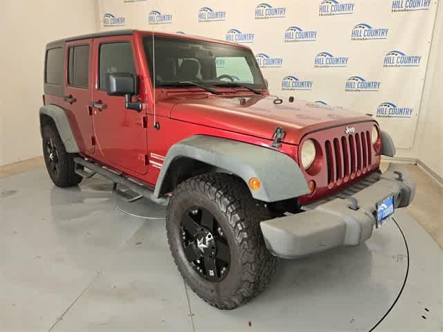 used 2013 Jeep Wrangler Unlimited car, priced at $15,895