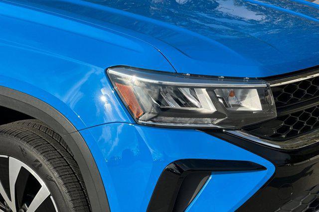 used 2023 Volkswagen Taos car, priced at $19,588