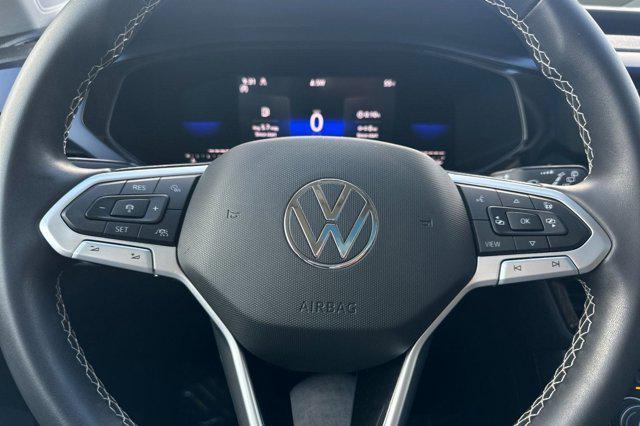 used 2023 Volkswagen Taos car, priced at $19,588