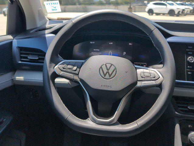 used 2024 Volkswagen Taos car, priced at $21,697
