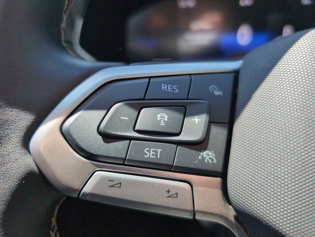 used 2024 Volkswagen Taos car, priced at $21,697