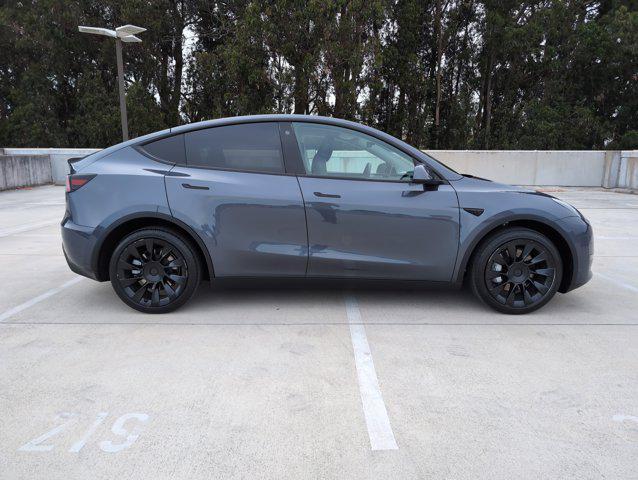 used 2023 Tesla Model Y car, priced at $32,999