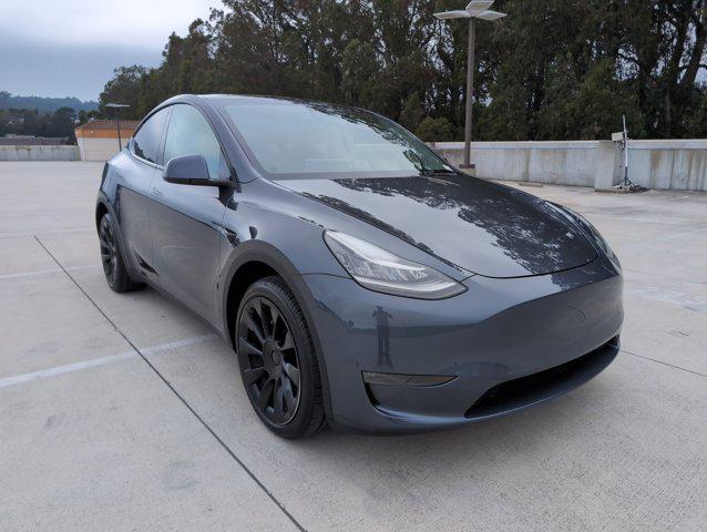 used 2023 Tesla Model Y car, priced at $32,999