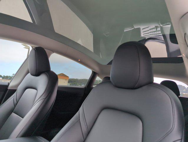 used 2023 Tesla Model Y car, priced at $32,999