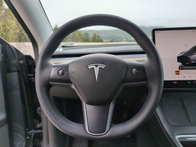 used 2023 Tesla Model Y car, priced at $32,999