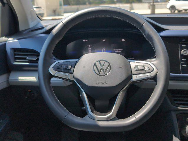 used 2024 Volkswagen Taos car, priced at $22,388