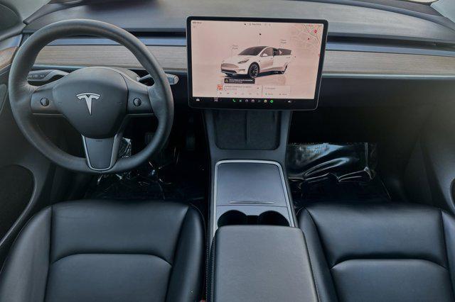 used 2023 Tesla Model Y car, priced at $29,999