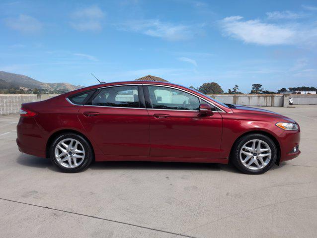 used 2015 Ford Fusion car, priced at $7,999