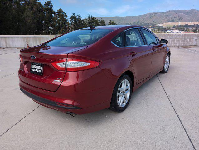 used 2015 Ford Fusion car, priced at $7,999