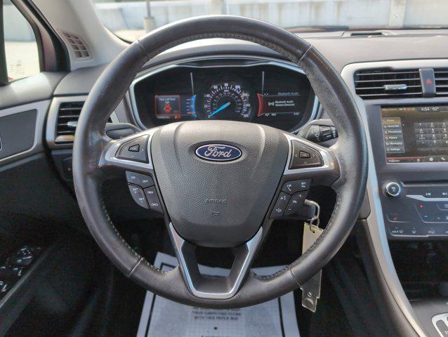 used 2015 Ford Fusion car, priced at $7,999