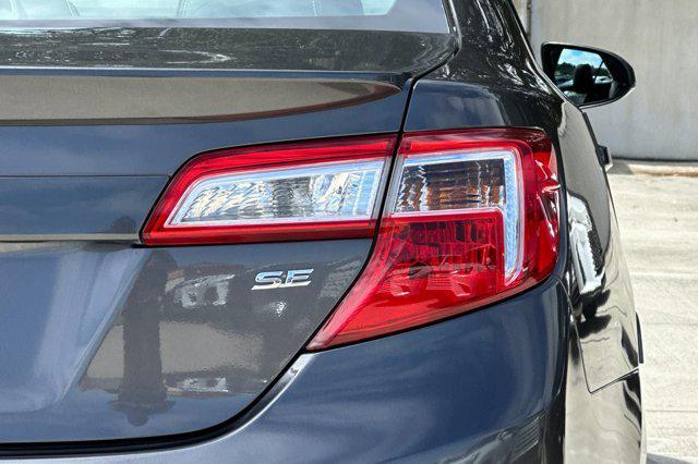 used 2014 Toyota Camry car, priced at $13,999