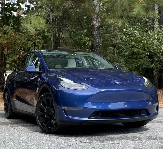 used 2022 Tesla Model Y car, priced at $28,999
