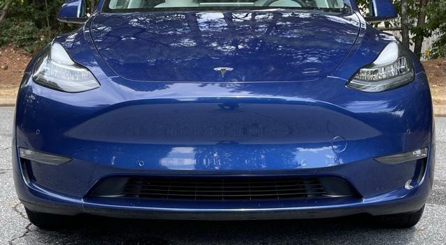 used 2022 Tesla Model Y car, priced at $28,999