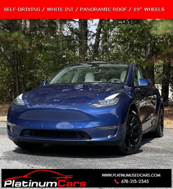 used 2022 Tesla Model Y car, priced at $28,999