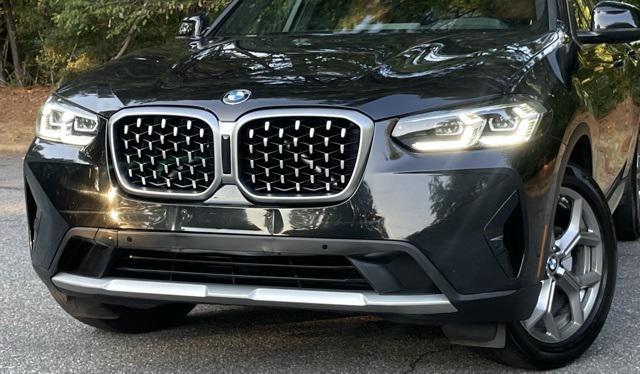 used 2023 BMW X4 car, priced at $42,999