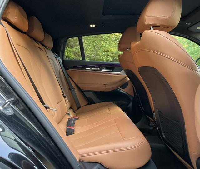 used 2023 BMW X4 car, priced at $42,999