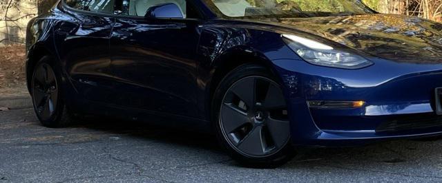 used 2023 Tesla Model 3 car, priced at $26,499