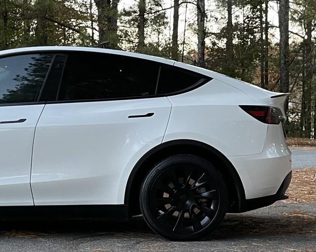 used 2023 Tesla Model Y car, priced at $29,540