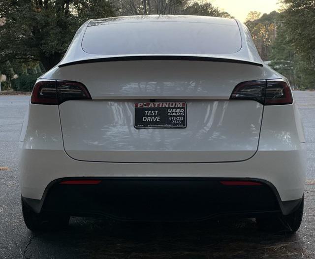 used 2023 Tesla Model Y car, priced at $29,540