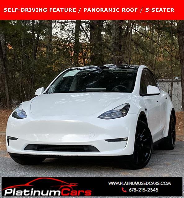 used 2023 Tesla Model Y car, priced at $29,540