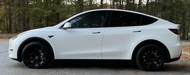 used 2023 Tesla Model Y car, priced at $29,540