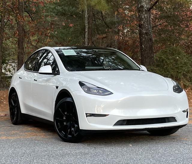 used 2023 Tesla Model Y car, priced at $29,540