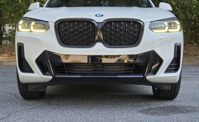 used 2022 BMW X4 car, priced at $41,299