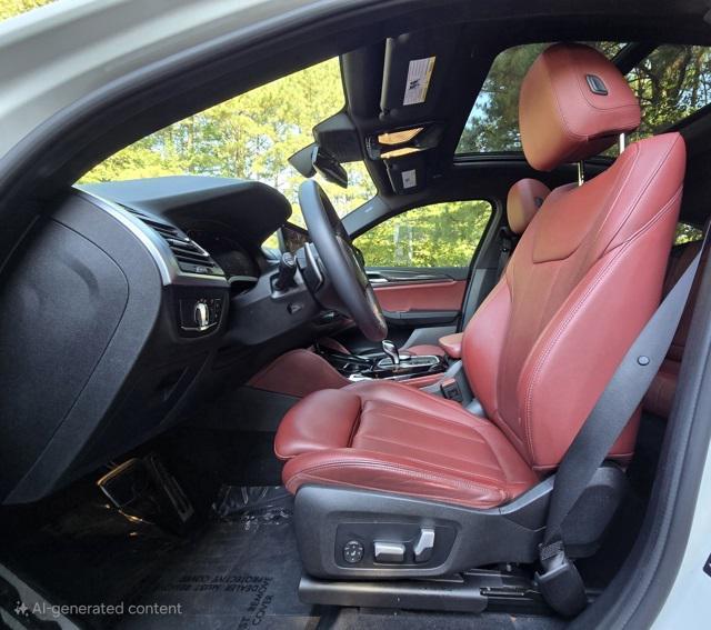 used 2022 BMW X4 car, priced at $41,299