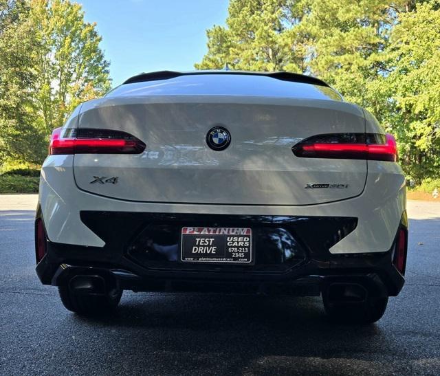 used 2022 BMW X4 car, priced at $41,299