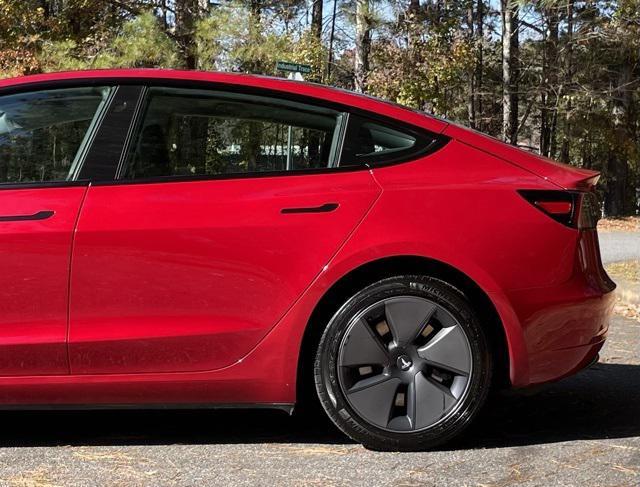 used 2023 Tesla Model 3 car, priced at $26,999