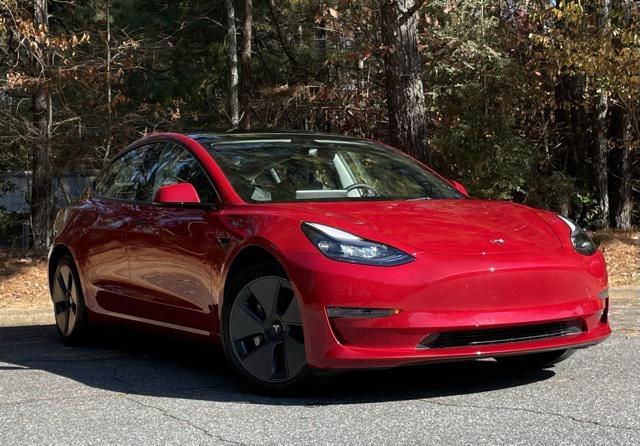used 2023 Tesla Model 3 car, priced at $26,999