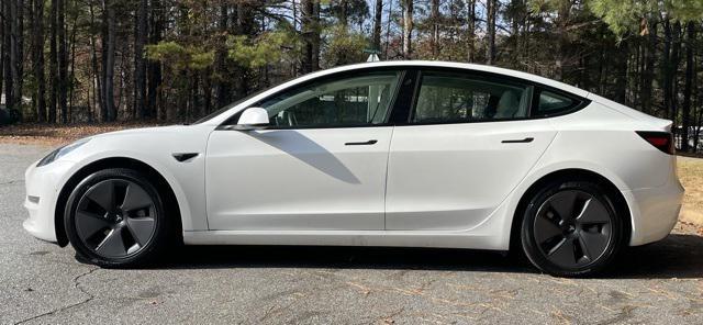 used 2022 Tesla Model 3 car, priced at $23,499