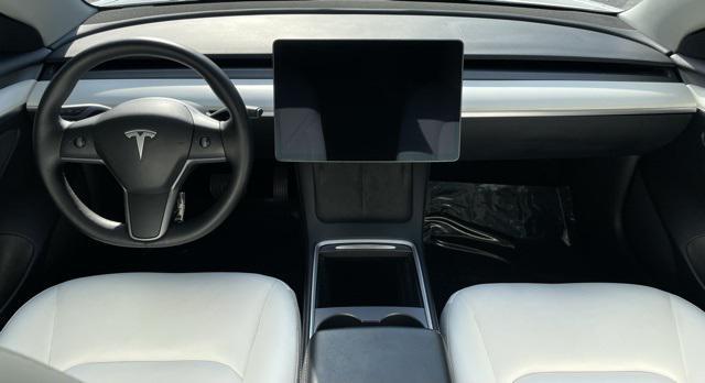 used 2022 Tesla Model 3 car, priced at $23,499